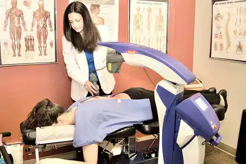 MLS laser therapy treatment session at Vital Mill Creek Chiropractic clinic